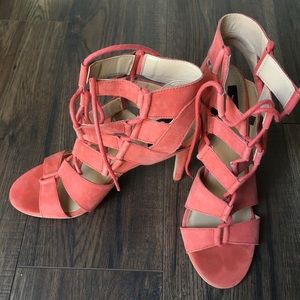 Strapped orange pink suede heels